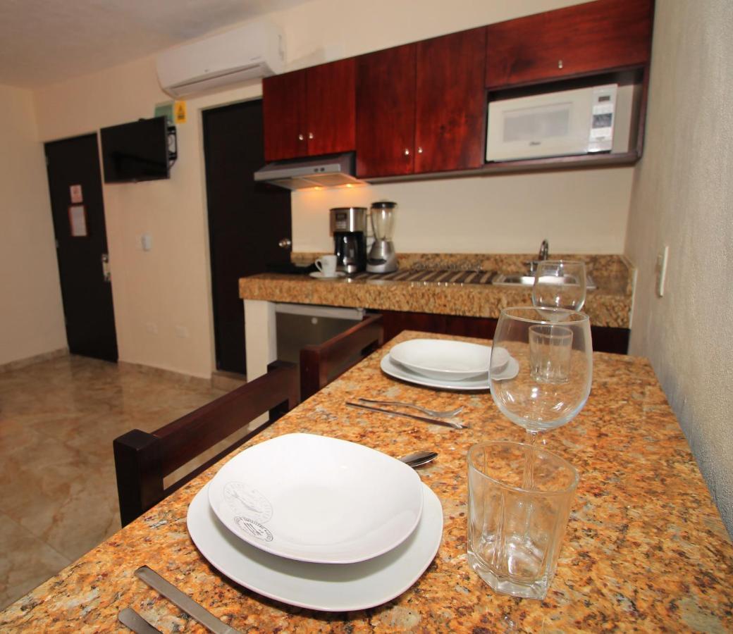 Papagayo Hotel Boutique Playa del Carmen Exterior photo Kitchenette
