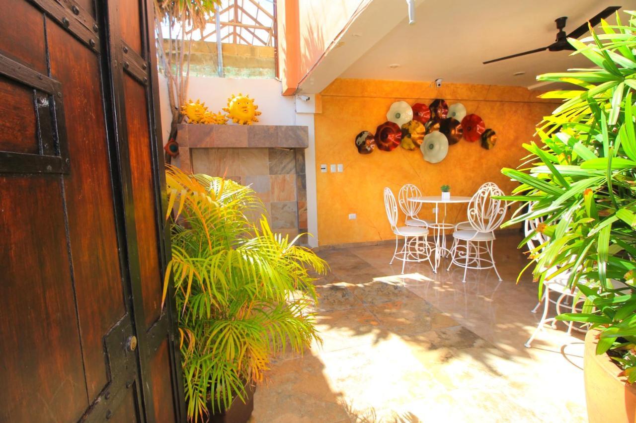 Papagayo Hotel Boutique Playa del Carmen Exterior photo The courtyard at the San Diego Museum of Contemporary Art