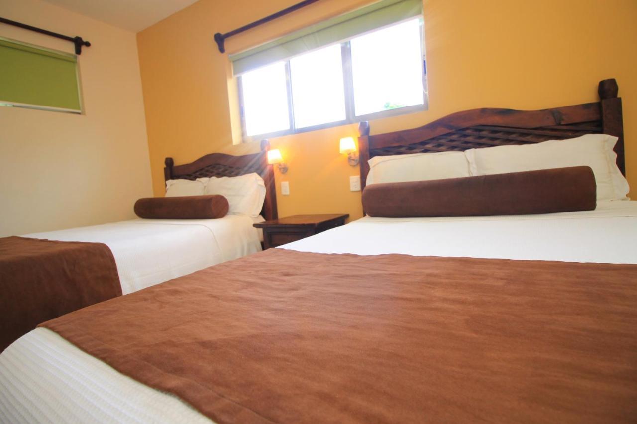 Papagayo Hotel Boutique Playa del Carmen Exterior photo A room at the hotel