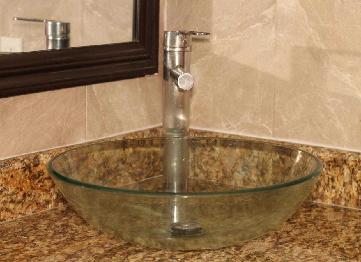 Papagayo Hotel Boutique Playa del Carmen Exterior photo A vessel sink
