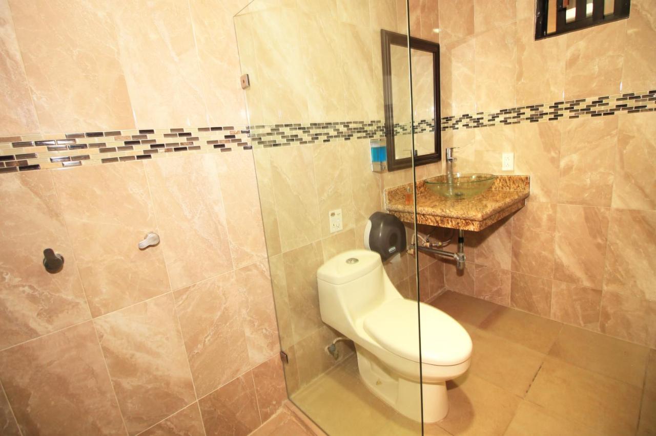 Papagayo Hotel Boutique Playa del Carmen Exterior photo Bathroom